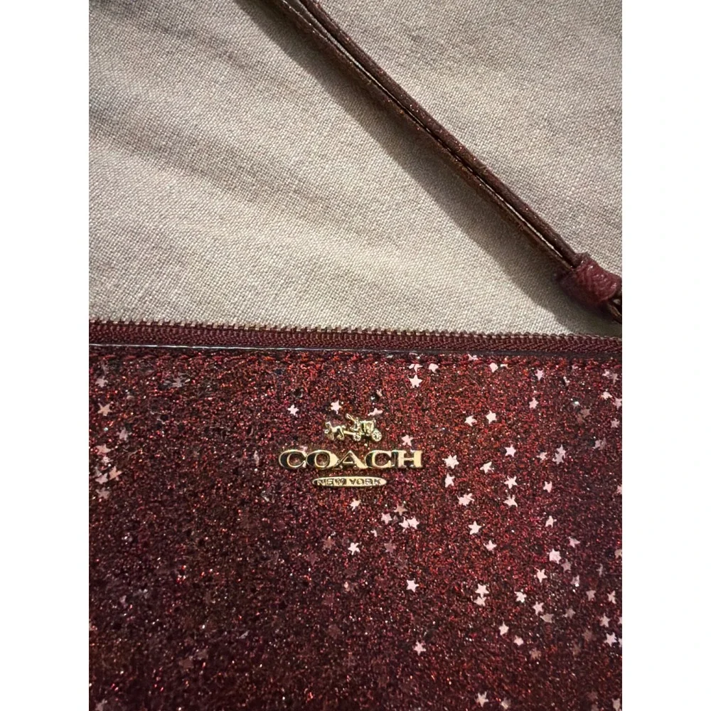 Coach Burgundy Glitter Star Wristlet Pouch Gold Logo Crossgrain Leather Wine